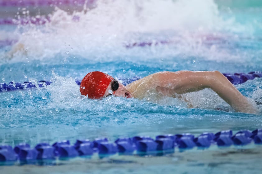 Boy Swimming at Swim Meet